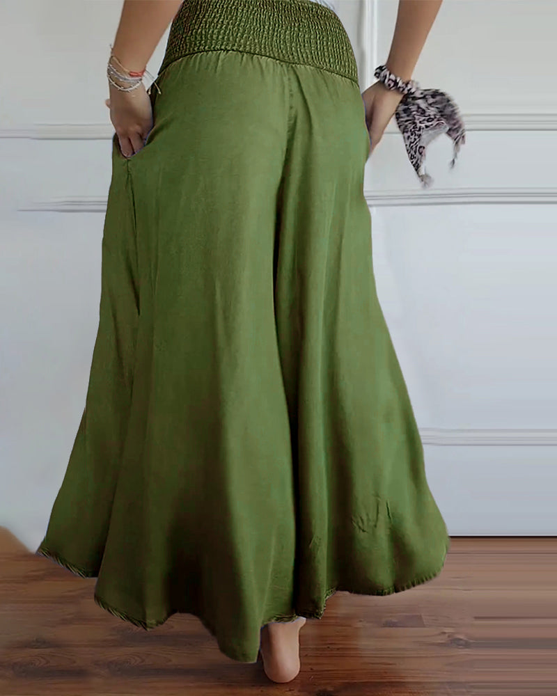 Pantalon à taille élastiquée et jambes larges