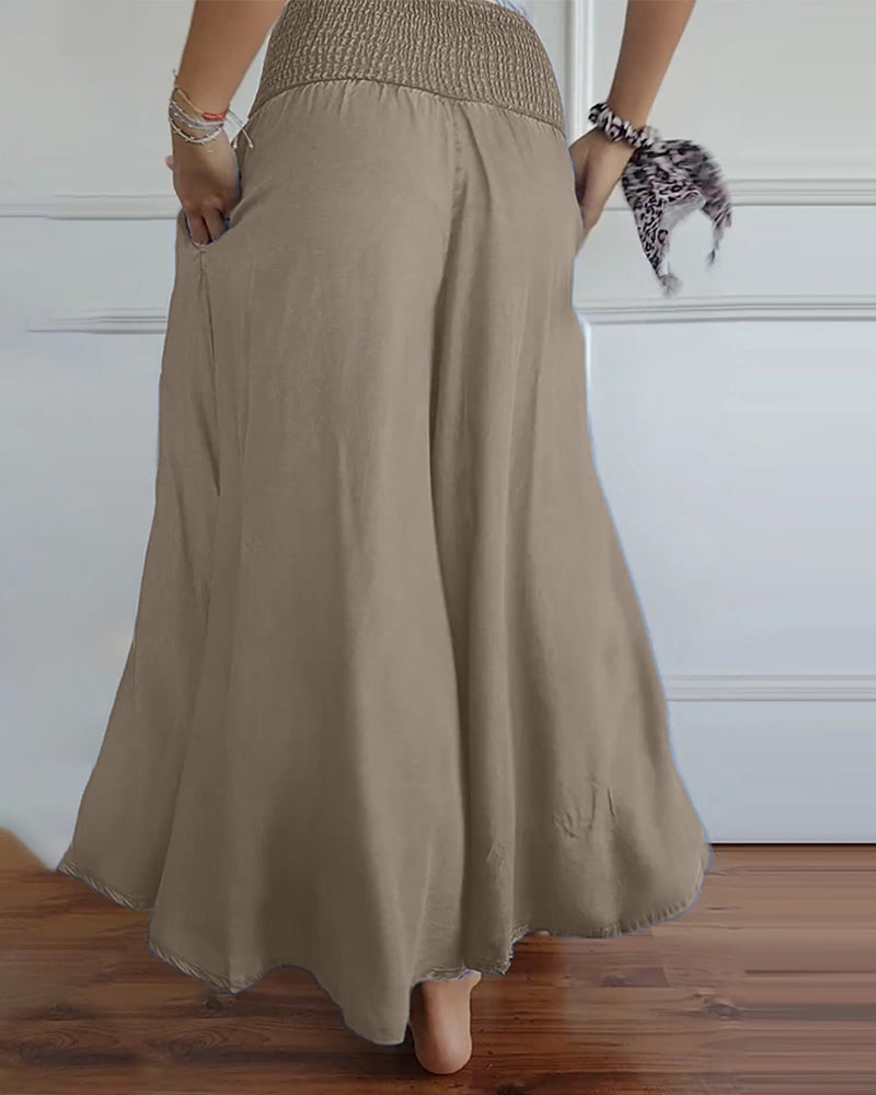 Pantalon à taille élastiquée et jambes larges